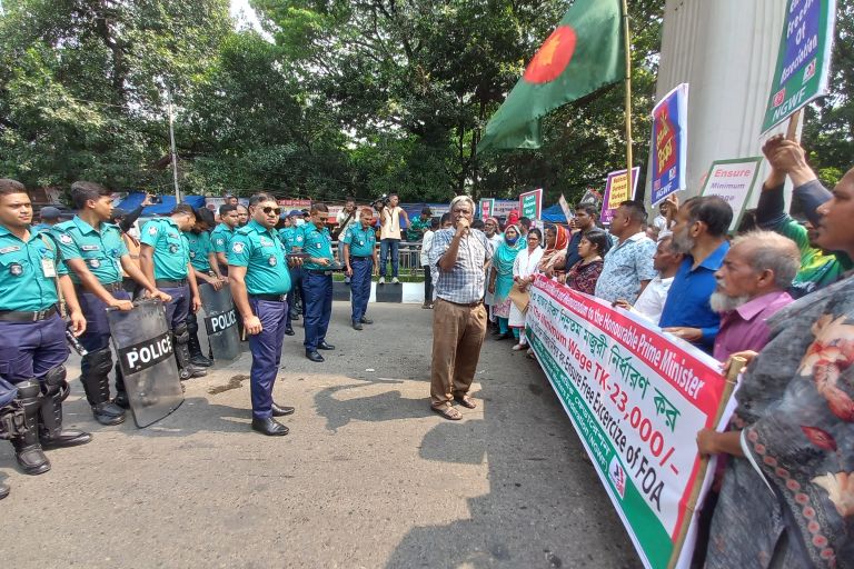 Workers protest for a 23,000Tk minimum wage run into police earlier in October 2023.